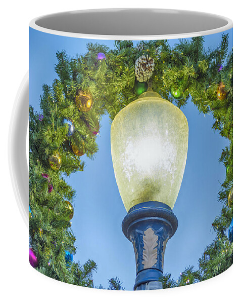 Long Beach Coffee Mug featuring the photograph Christmas Wreath Lampost by David Zanzinger