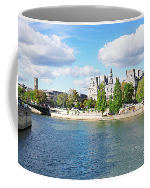 Paris Coffee Mug featuring the photograph Seine River Embankment by Anastasy Yarmolovich