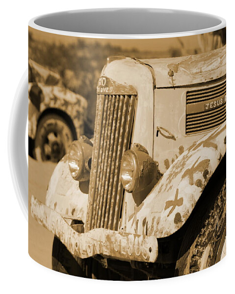 Front Of Truck Coffee Mug featuring the photograph Closeup Bible Truck in Sepia by Colleen Cornelius