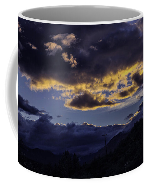 Alaska Coffee Mug featuring the photograph Clouds Over Alaska by Madeline Ellis