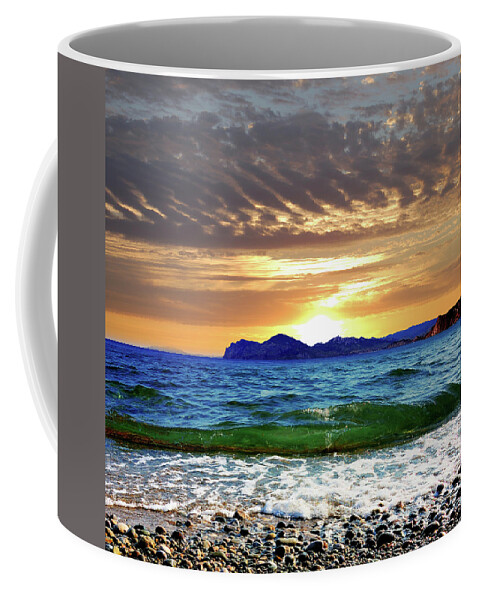 Sky Coffee Mug featuring the photograph Clouds over the sea at sunset by Yuri Hope