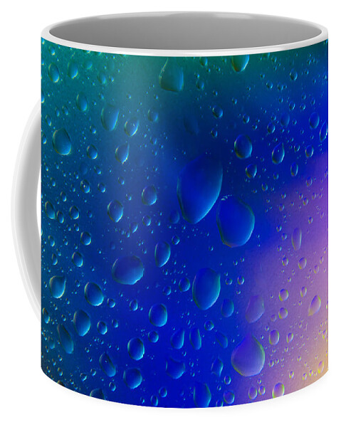 Abstract Coffee Mug featuring the photograph Colorfull Water drop background abstract by Michalakis Ppalis
