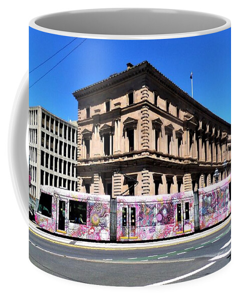 Tram Coffee Mug featuring the photograph Colourful Tram at Old Treasury Building by Yolanda Caporn