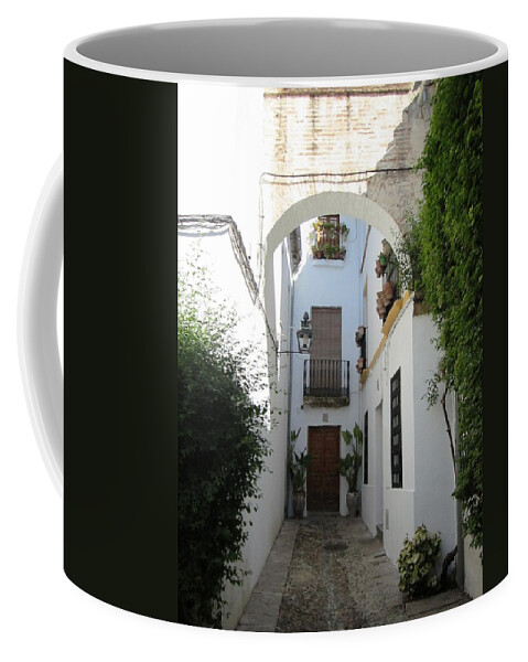 Cordoba Coffee Mug featuring the photograph Cordoba Walkway with Cobble Stone Archway Spain by John Shiron