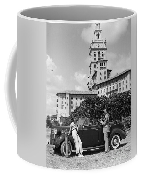 1930s Coffee Mug featuring the photograph Couple At The Biltmore Hotel, Miami by H. Armstrong Roberts/ClassicStock