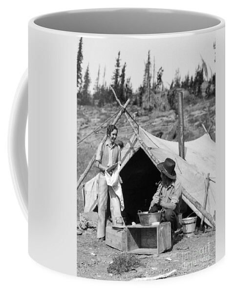1930s Coffee Mug featuring the photograph Couple Roughing It, C.1930s by H. Armstrong Roberts/ClassicStock