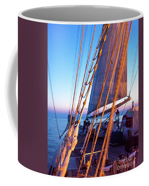 Aegis Coffee Mug featuring the photograph Crusing Into Sunrise by Hannes Cmarits