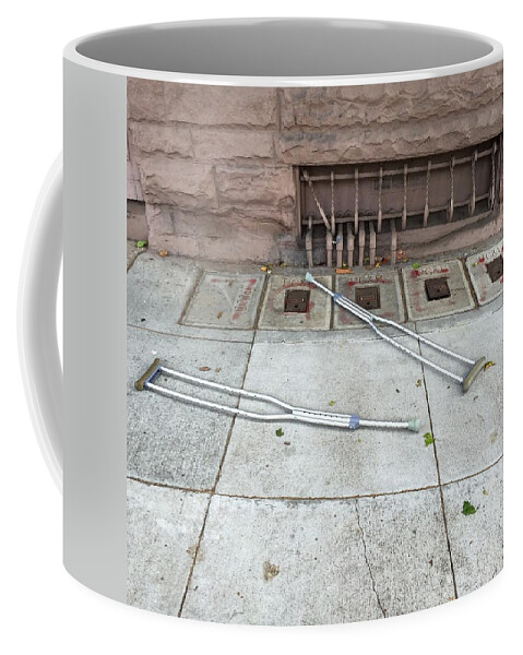 Street Coffee Mug featuring the photograph Crutches by Erik Burg
