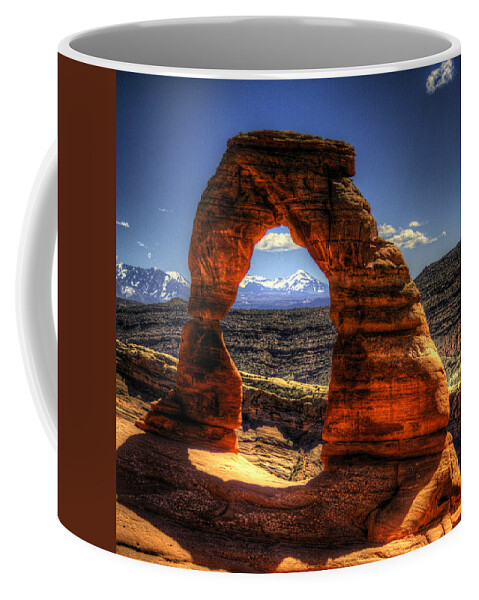Pictorial Coffee Mug featuring the photograph Delicate Arch Framing La Sal Mountains by Roger Passman