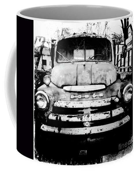 Car Coffee Mug featuring the photograph Dodged by Kevyn Bashore