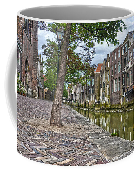 Dordrecht Coffee Mug featuring the photograph Dordrecht Behind The Church by Frans Blok