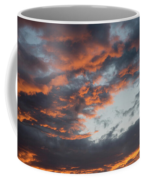 Stormy Clouds Coffee Mug featuring the photograph Dramatic sunset sky with orange cloud colors by Michalakis Ppalis
