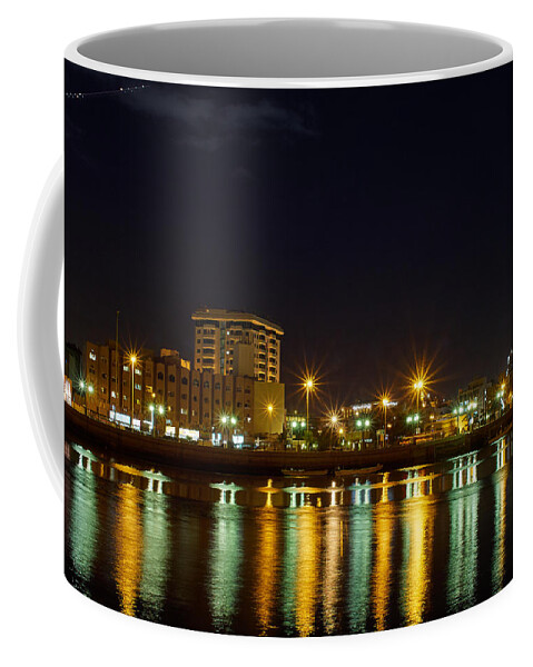 Emirates Coffee Mug featuring the photograph Dubai Creek by Night with the plane by Jouko Lehto