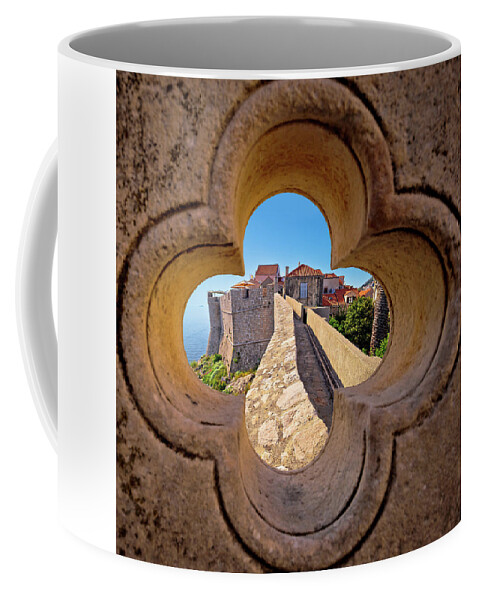 Dubrovnik Coffee Mug featuring the photograph Dubrovnik city walls view through stone carved detail by Brch Photography