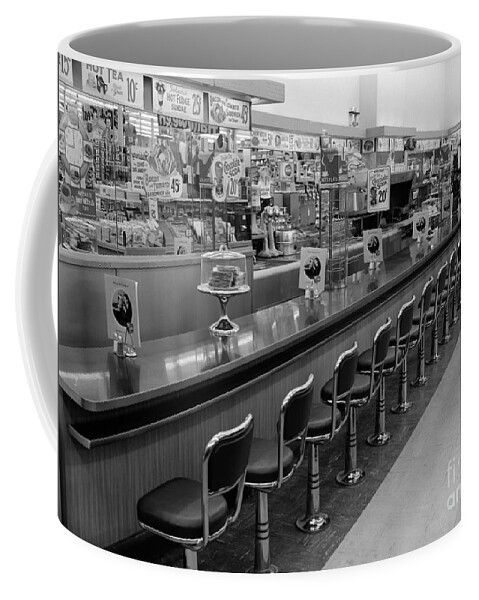1950s Coffee Mug featuring the photograph Empty Diner, C.1950-60s by H. Armstrong Roberts/ClassicStock