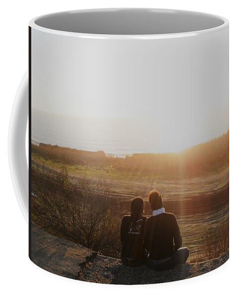 Sunset Coffee Mug featuring the photograph Enjoying the sunset by Maria Aduke Alabi