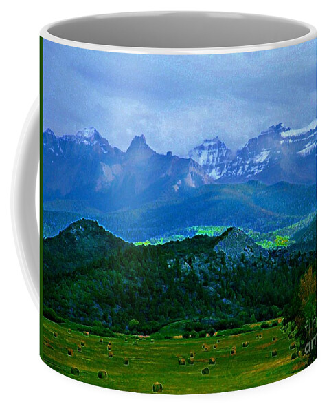 Blues And Greens Show Off This Mysterious And Peaceful Colorado Scene Of Hay Fields And Majestic Mountains. Coffee Mug featuring the digital art Fall before the San Juans by Annie Gibbons