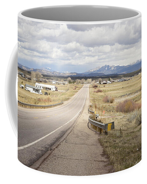 Highway; Distance; Horizon; Future; Village; Lonesome; Far Mountains; Perspective; Vista; Range; Scope; New Mexico Coffee Mug featuring the photograph Far Horizon by Tom Cochran