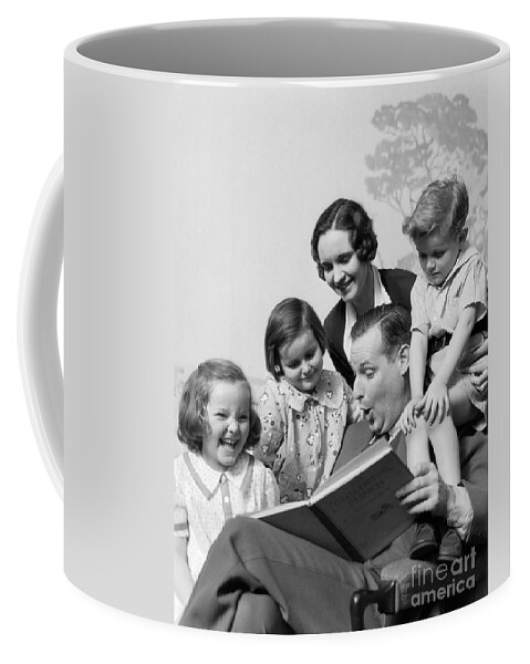 1920s Coffee Mug featuring the photograph Father Reading To Family, C.1930s by H. Armstrong Roberts/ClassicStock