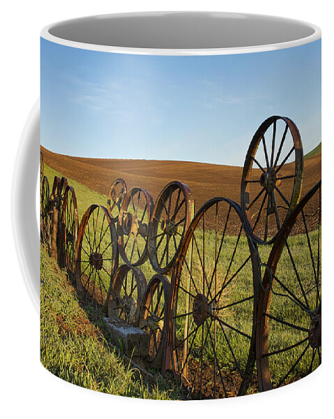 Palouse Coffee Mug featuring the photograph Fence of Wheels by Mary Lee Dereske
