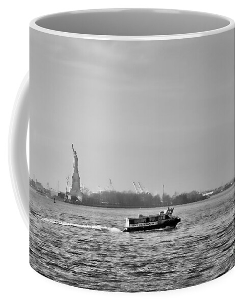 Nyc Coffee Mug featuring the photograph Ferry with Statue of Liberty in View by Chuck Kuhn