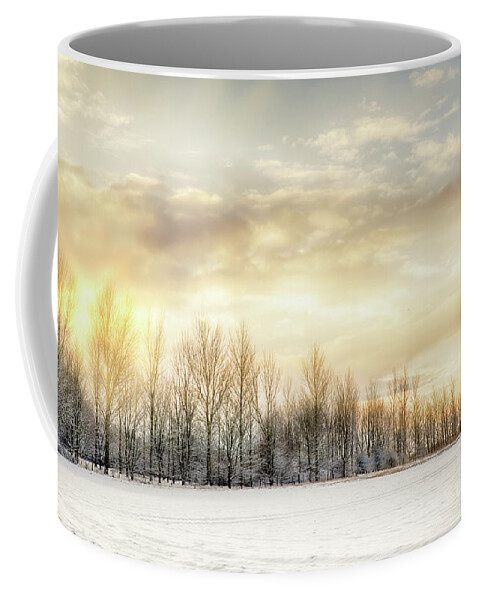 Snow Coffee Mug featuring the photograph Fire sky over snow fields by Simon Bratt