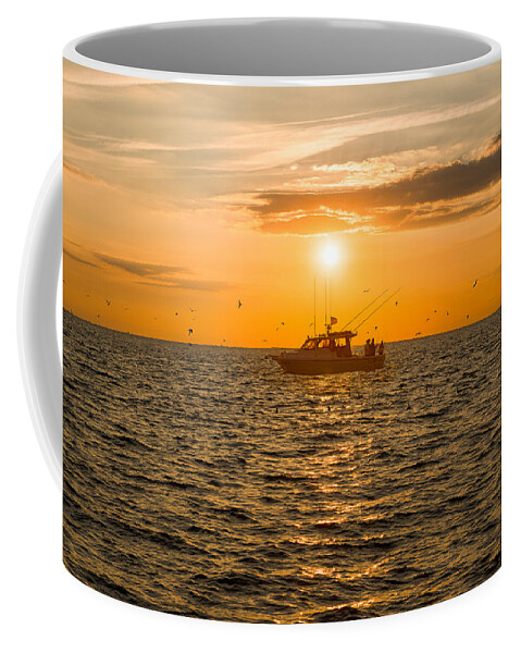 Fishing Coffee Mug featuring the photograph Fishing as the Sun Goes Down by Mark Rogers
