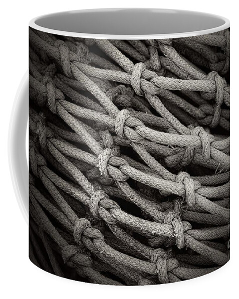 Rope Coffee Mug featuring the photograph Fishing Nets by Clare Bevan