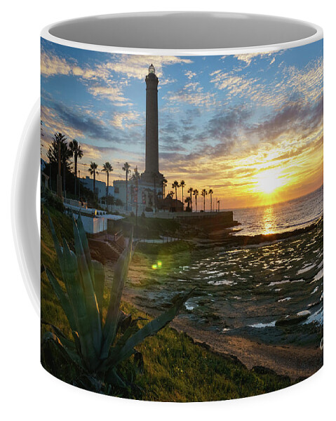 Andalucia Coffee Mug featuring the photograph Flaring Sun at Chipiona Lighthouse Cadiz Spain by Pablo Avanzini