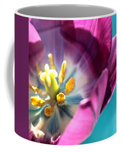 Tulip Coffee Mug featuring the photograph Floater by Bobby Villapando