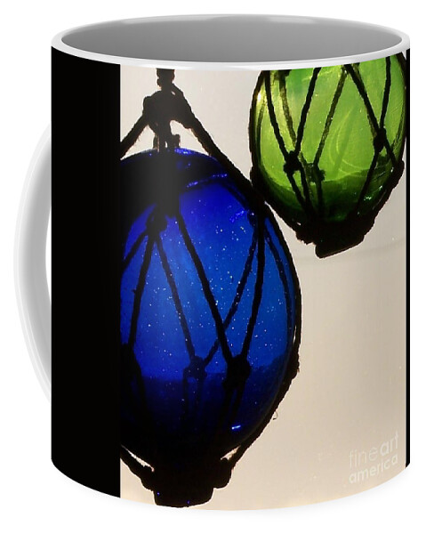 Glass Floats Coffee Mug featuring the photograph Floats by Jackie Mueller-Jones