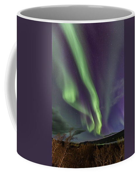 Aurora Coffee Mug featuring the photograph Flowing aurora by Hitendra SINKAR