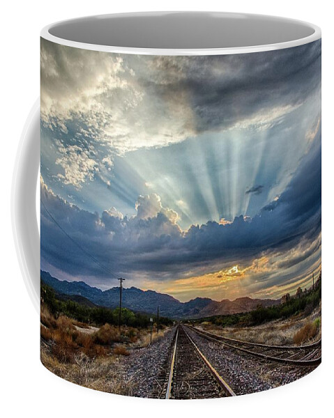 Crepuscular Coffee Mug featuring the photograph Follow the rays by Gaelyn Olmsted