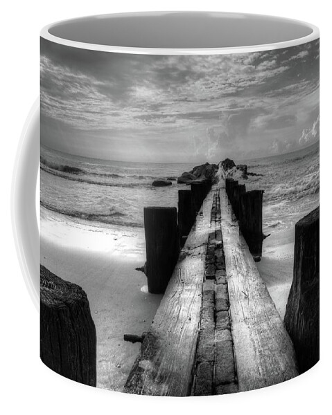 Folly Beach Pilings Coffee Mug featuring the photograph Folly Beach Pilings Charleston South Carolina In Black and White by Carol Montoya