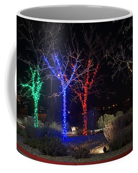 Winter Coffee Mug featuring the photograph Four Lighted Trees by Susan Brown