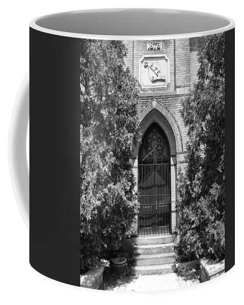 Building Coffee Mug featuring the photograph Gated Brick Building by Phil Perkins