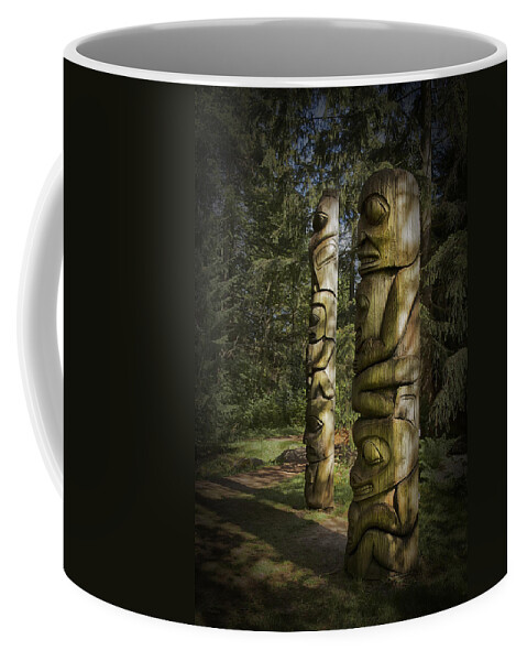 Theresa Tahara Coffee Mug featuring the photograph Gitksan Totem Poles by Theresa Tahara