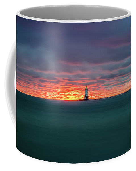Ludington Mi Coffee Mug featuring the photograph Glowing Sunset on Lake With Lighthouse by Lester Plank
