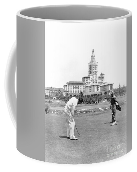1940s Coffee Mug featuring the photograph Golfing At The Biltmore, Miami by H. Armstrong Roberts/ClassicStock