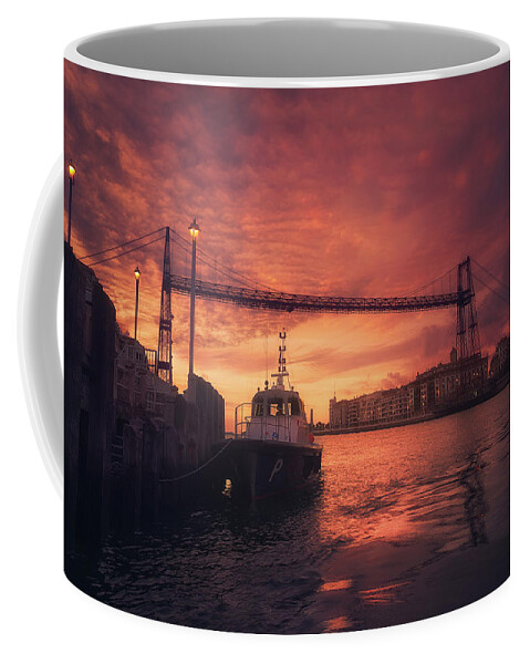 Hanging Coffee Mug featuring the photograph Hanging Bridge Of Vizcaya At Sunset by Mikel Martinez de Osaba