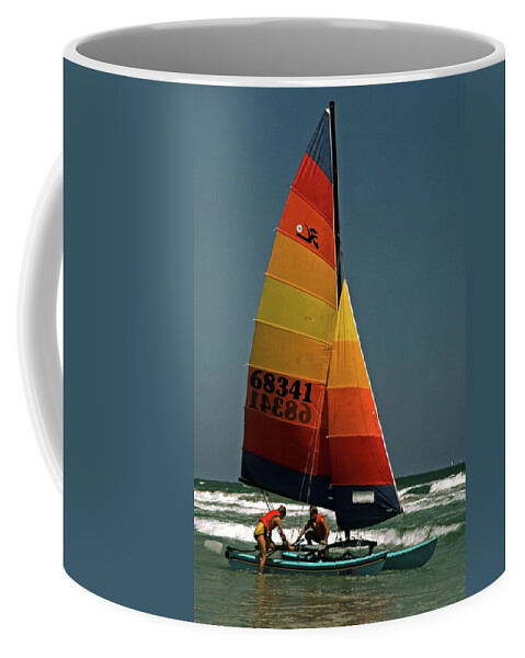 2 Men Board Small Catamaran Sailboat Coffee Mug featuring the photograph Hobie Cat in Surf by Sally Weigand