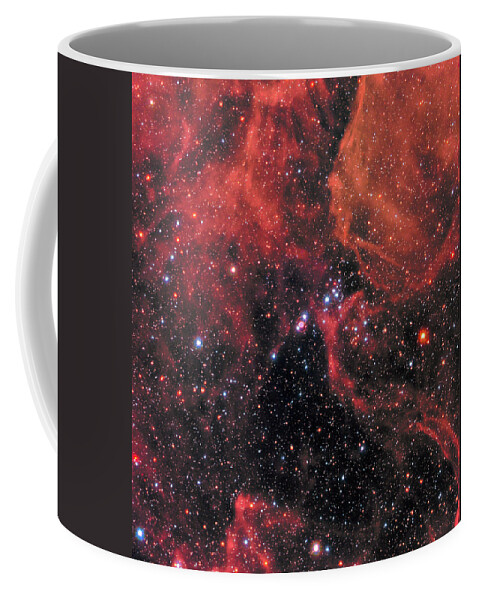 Hubble Coffee Mug featuring the photograph Hubble Captures Wide View of Supernova 1987A by Eric Glaser