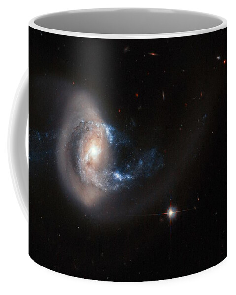 Nebula Coffee Mug featuring the painting Hubble image of NGC 7714 by Celestial Images