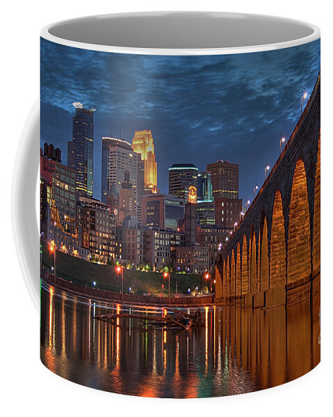 Minneapolis Stone Arch Bridge Coffee Mug featuring the photograph Iconic Minneapolis Stone Arch Bridge by Wayne Moran