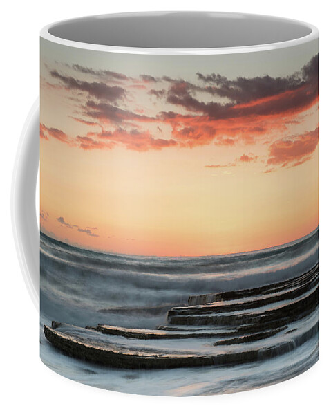 Sunset Coffee Mug featuring the photograph Idyllic sunset and waving ocean by Michalakis Ppalis