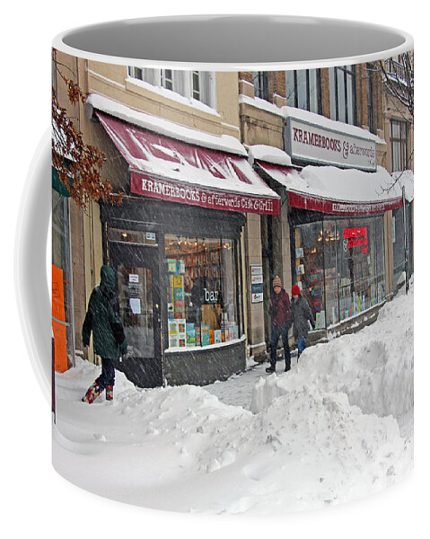 Snow Coffee Mug featuring the photograph In A Snow Storm Outside Kramerbooks by Cora Wandel