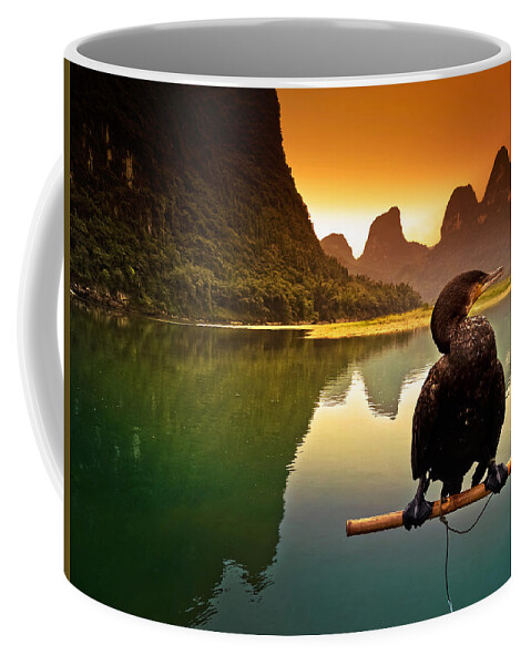 Sunset Coffee Mug featuring the photograph In the rest of cormorant watching the sunset-China Guilin scenery Lijiang River in Yangshuo by Artto Pan