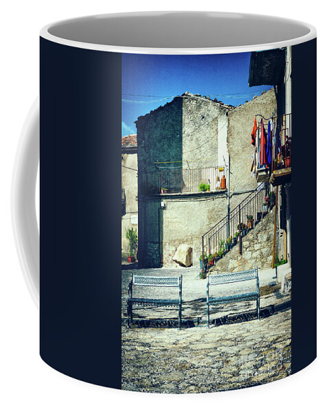 Architecture Coffee Mug featuring the photograph Italian square with benches by Silvia Ganora