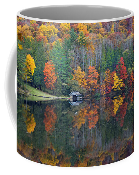 Fall Scene Coffee Mug featuring the photograph Lake Logan Boathouse in Fall by Mike McGlothlen