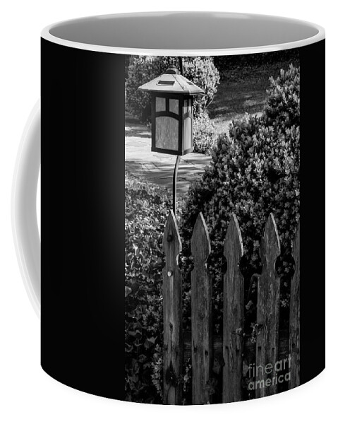 Roanoke Coffee Mug featuring the photograph Lamp and Gate 2 by Bob Phillips